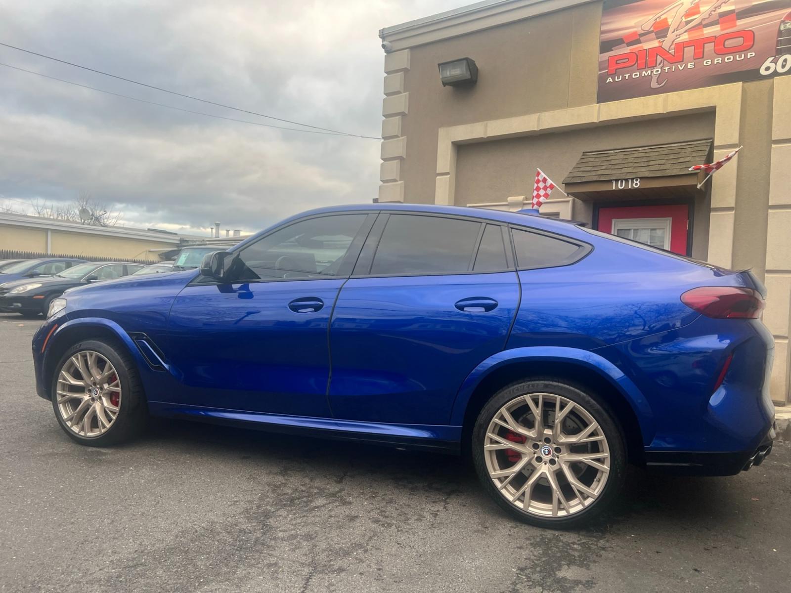2022 Blue /Red/Black BMW X6 M Base (5YMCY0C07N9) with an 4.4L V8 DOHC 32V engine, 8A transmission, located at 1018 Brunswick Ave, Trenton, NJ, 08638, (609) 989-0900, 40.240086, -74.748085 - Holy Cow and Wow!!...That is the description on this absolutely stunning BMW X6 M Competition! Ordered by Anthony himself with the best color choice of Marina Bay Blue metallic and Red Interior to stand out on the road and to any enthusiast of the BMW X series! Executive Pkg. includes Remote Start, - Photo #28